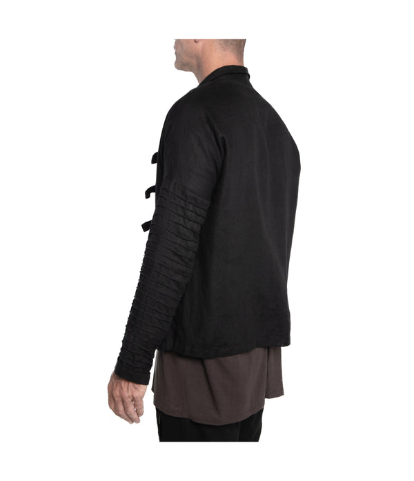 Men's kimono style jacket crafted from 100% linen, featuring ribbed detail down the sleeves, 3 front-tie fastening and 2 front pockets.  100% linen
