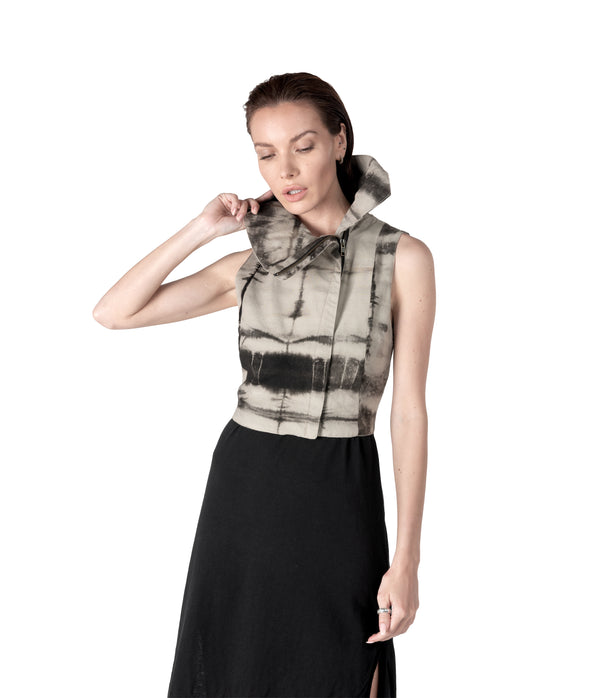 plant dyed cropped women sleeveless vest with high flared collar.  Zippers along waist line.  Hand cast snake claw front zipper pull.