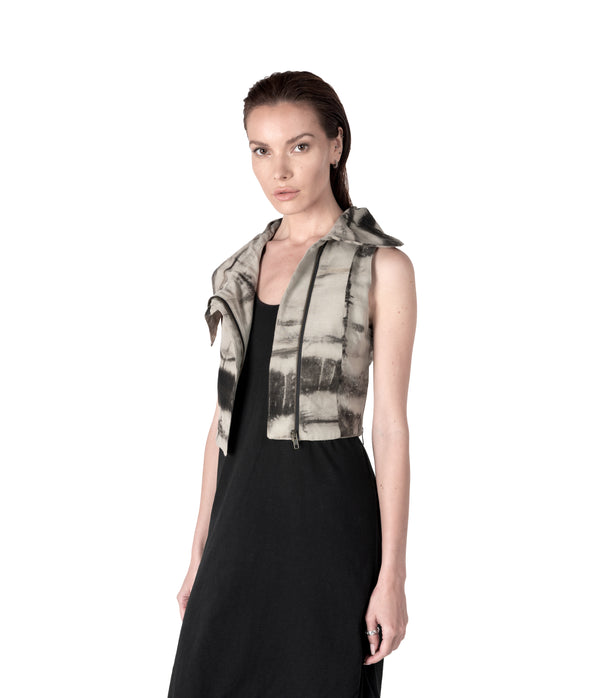 plant dyed cropped women sleeveless vest with high flared collar. Zippers along waist line. Hand cast snake claw front zipper pull.