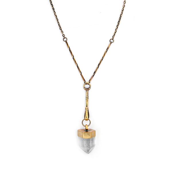 Necklace with a gold and silver pendant on a white background