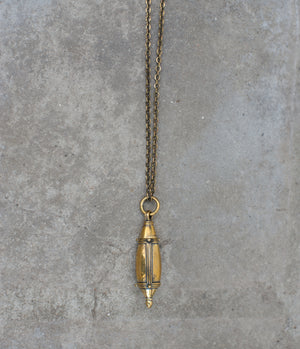 Gorgeous brass bottle pendant on matching chain.  Twists open to reveal a spike perfect for dabbing on your favorite perfume. A necklace of my design, the tear drop bottle has been hand cast. 