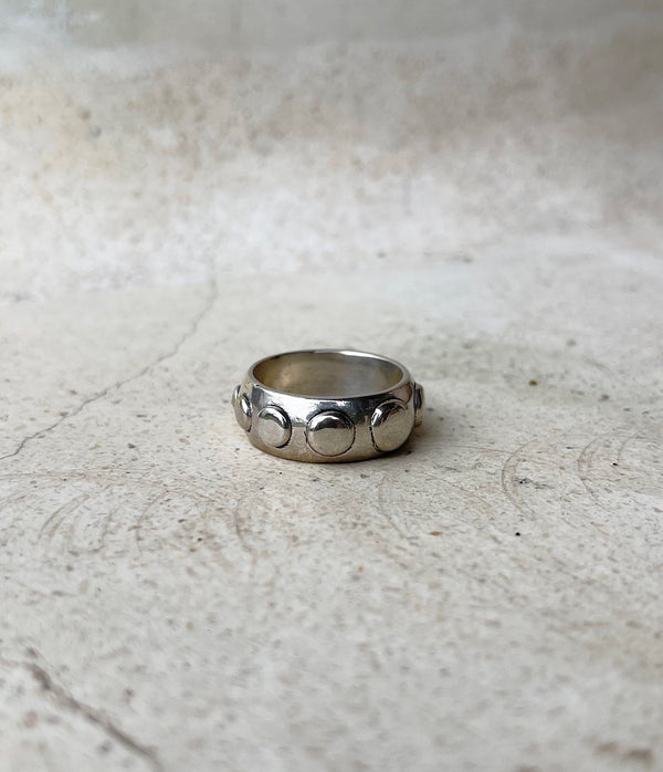 Handmade silver ring band with circle detail. Can be worn by a man or a woman, unisex and minimalist.